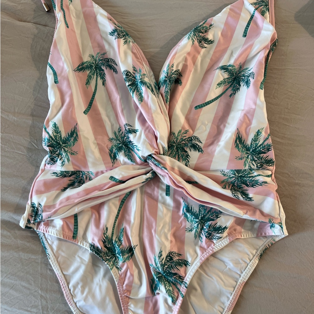 Kenny Flowers deep plunge one piece